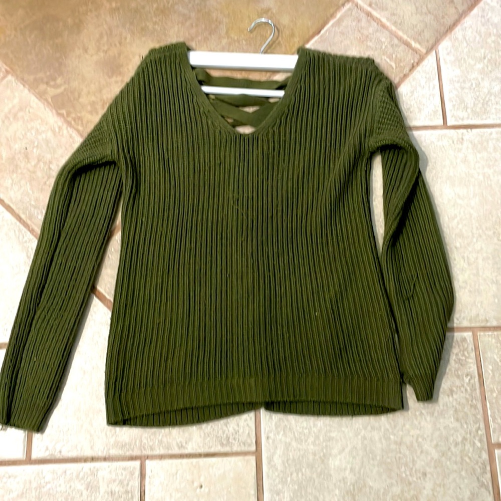 A green sweater